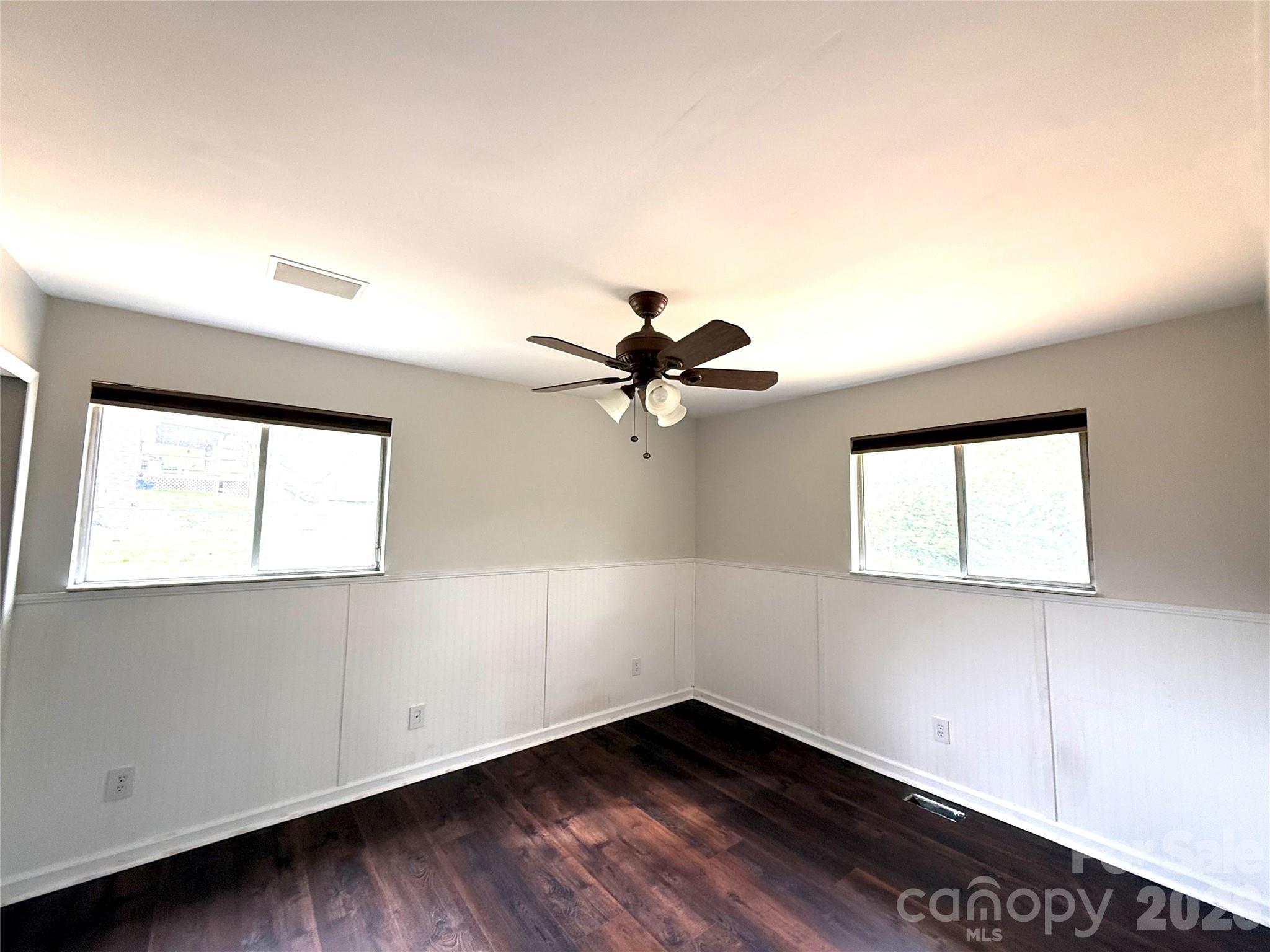 18 Briar Fork Way, Unit 4 Fletcher, NC 28732 - Photo 12 of 36 wooden floor in an empty room with a window
