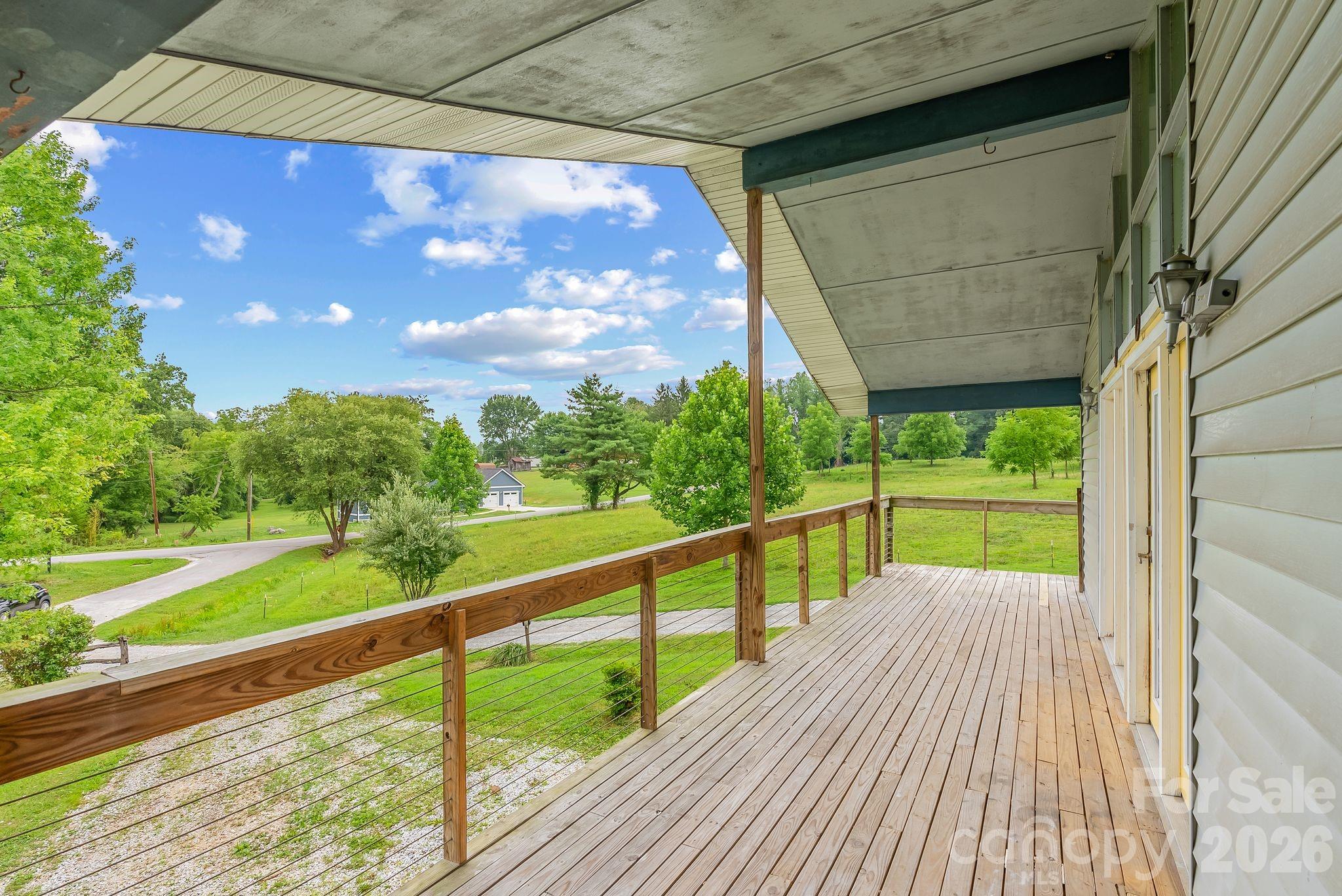 18 Briar Fork Way, Unit 4 Fletcher, NC 28732 - Photo 23 of 36 a view of a balcony with yard