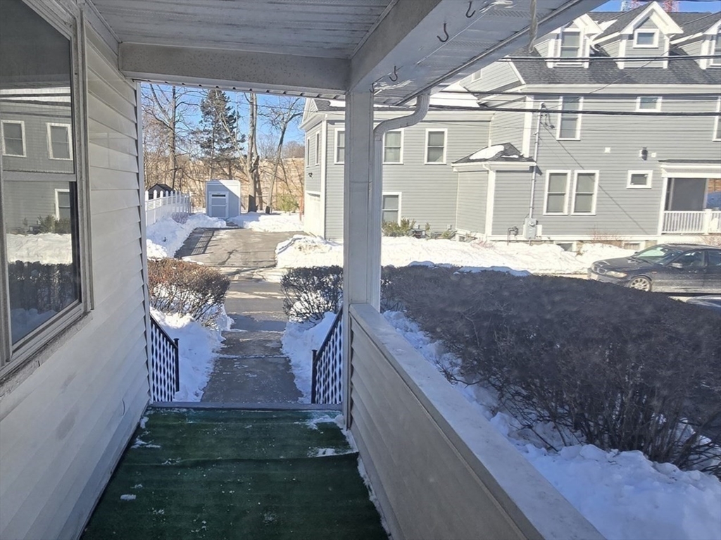 8 Curve Street Newton, MA 02465 - Photo 6 of 6 a front view of a house with a yard