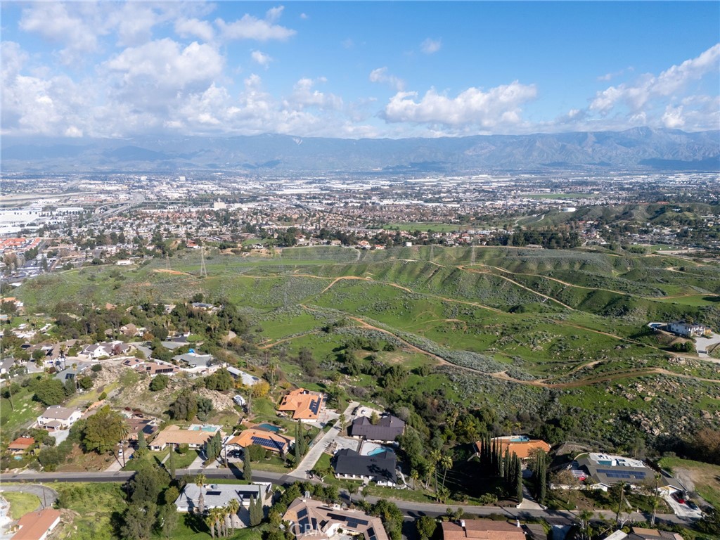 0 Thompson Drive Grand Terrace, CA 92313 - Photo 11 of 16 an aerial view of residential houses with outdoor space
