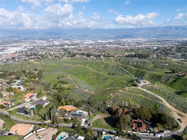 an aerial view of a houses with outdoor space
