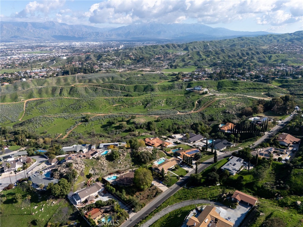 0 Thompson Drive Grand Terrace, CA 92313 - Photo 9 of 16 an aerial view of a city with lots of residential buildings