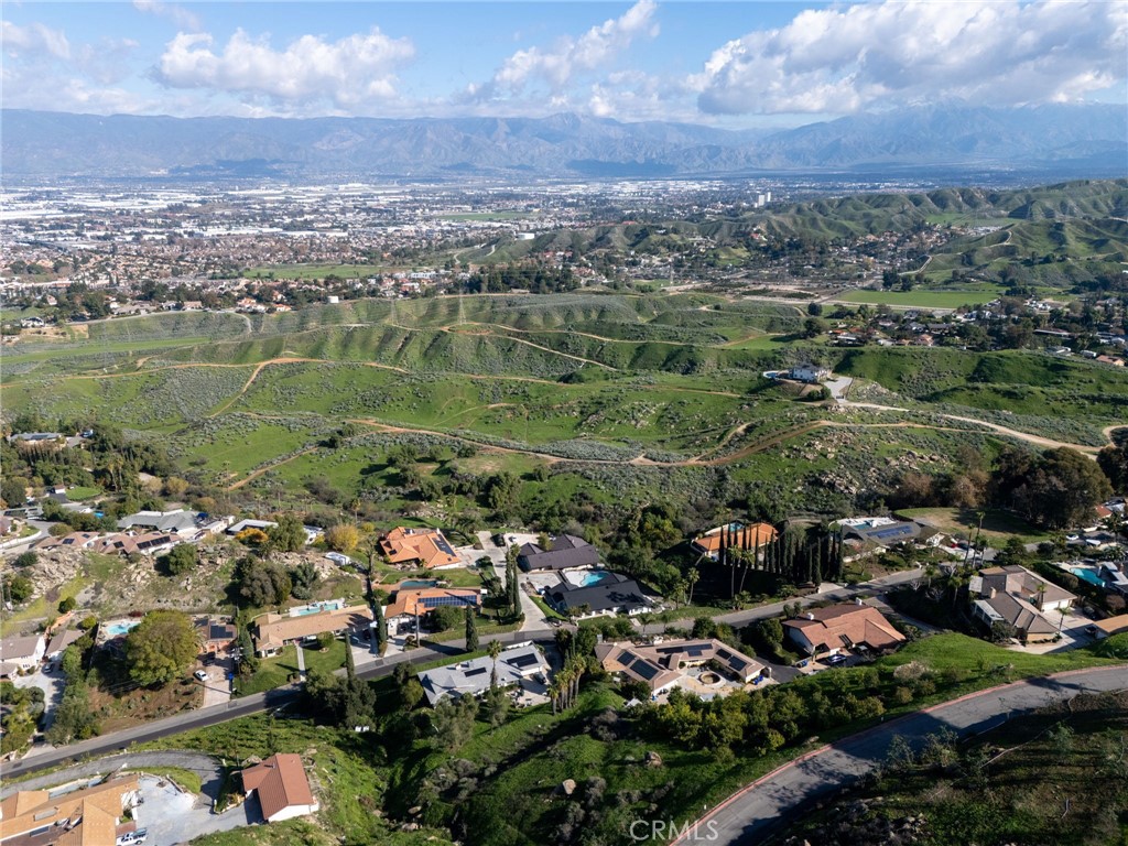 0 Thompson Drive Grand Terrace, CA 92313 - Photo 10 of 16 an aerial view of a city with lots of residential buildings