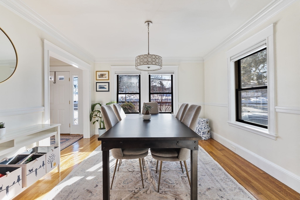 424 Brook Road Milton, MA 02186 - Photo 10 of 41 a view of a dining room with furniture window and wooden floor
