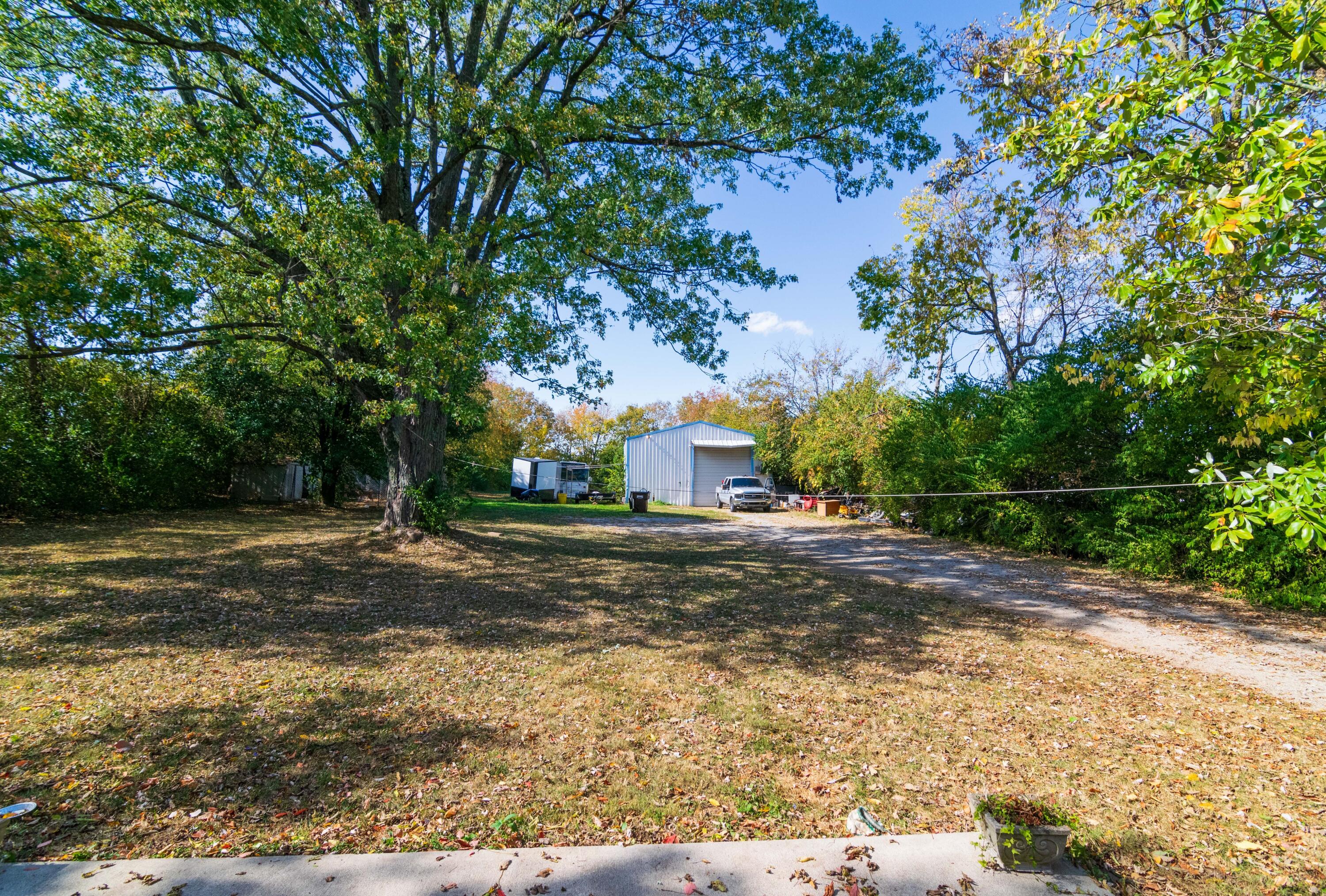 1465 Greendale Road Lexington, KY 40511 - Photo 6 of 13 yard with pole barn