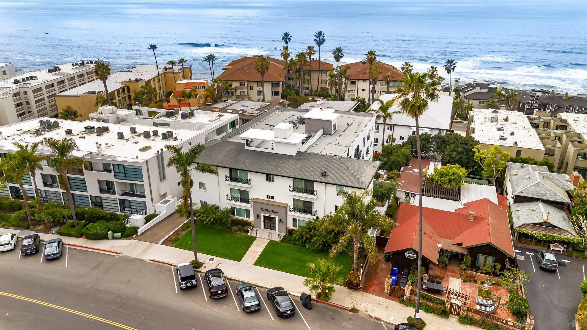 230 Prospect Street, Unit 12 La Jolla, CA 92037 - Photo 3 of 14 an aerial view of multiple houses with yard