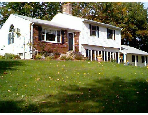 45 Gleason Road Princeton, MA 01541 - Photo 1 of 1 a front view of a house with garden