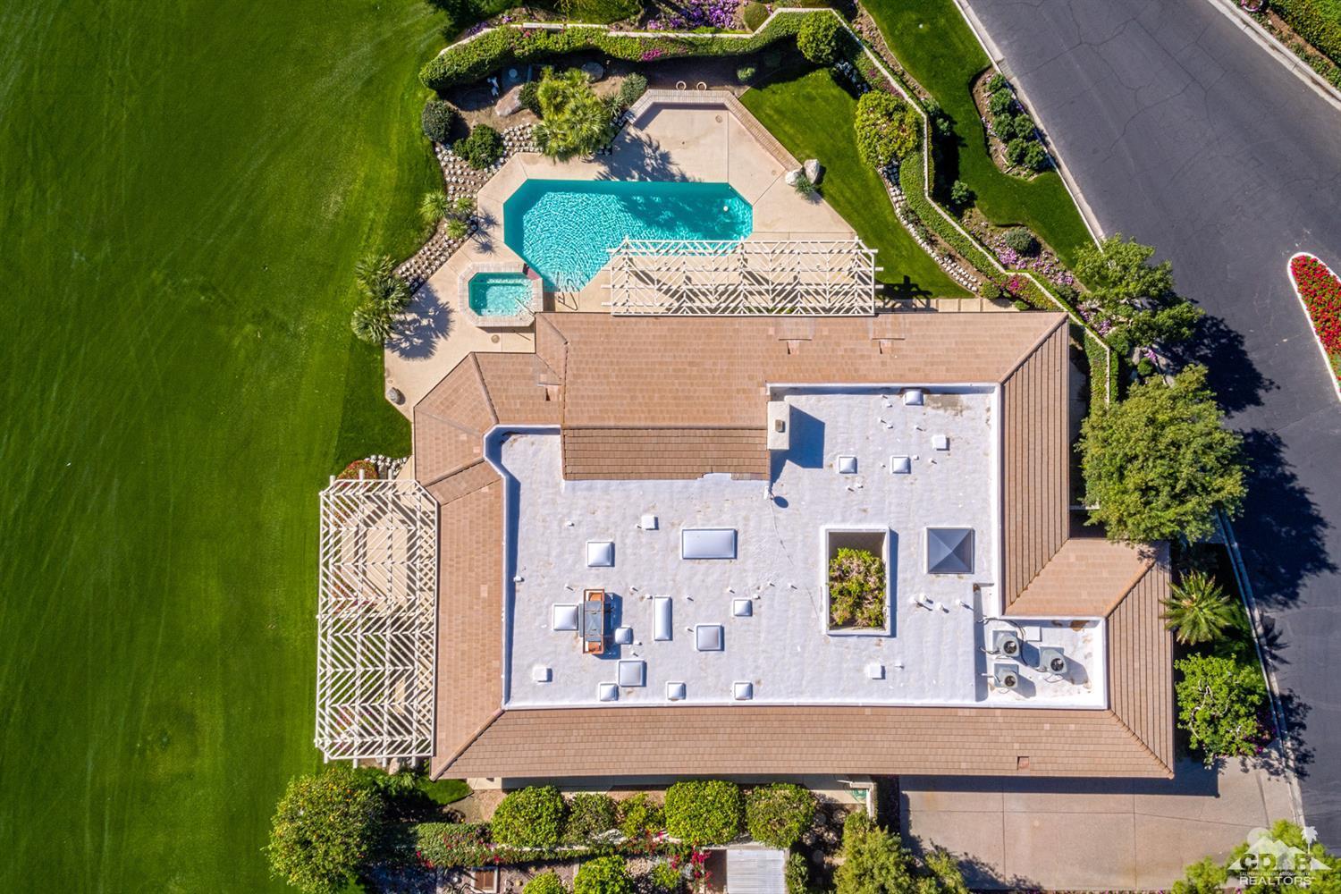 24 Johnar Boulevard Rancho Mirage, CA 92270 - Photo 19 of 26 an aerial view of residential houses with outdoor space and trees