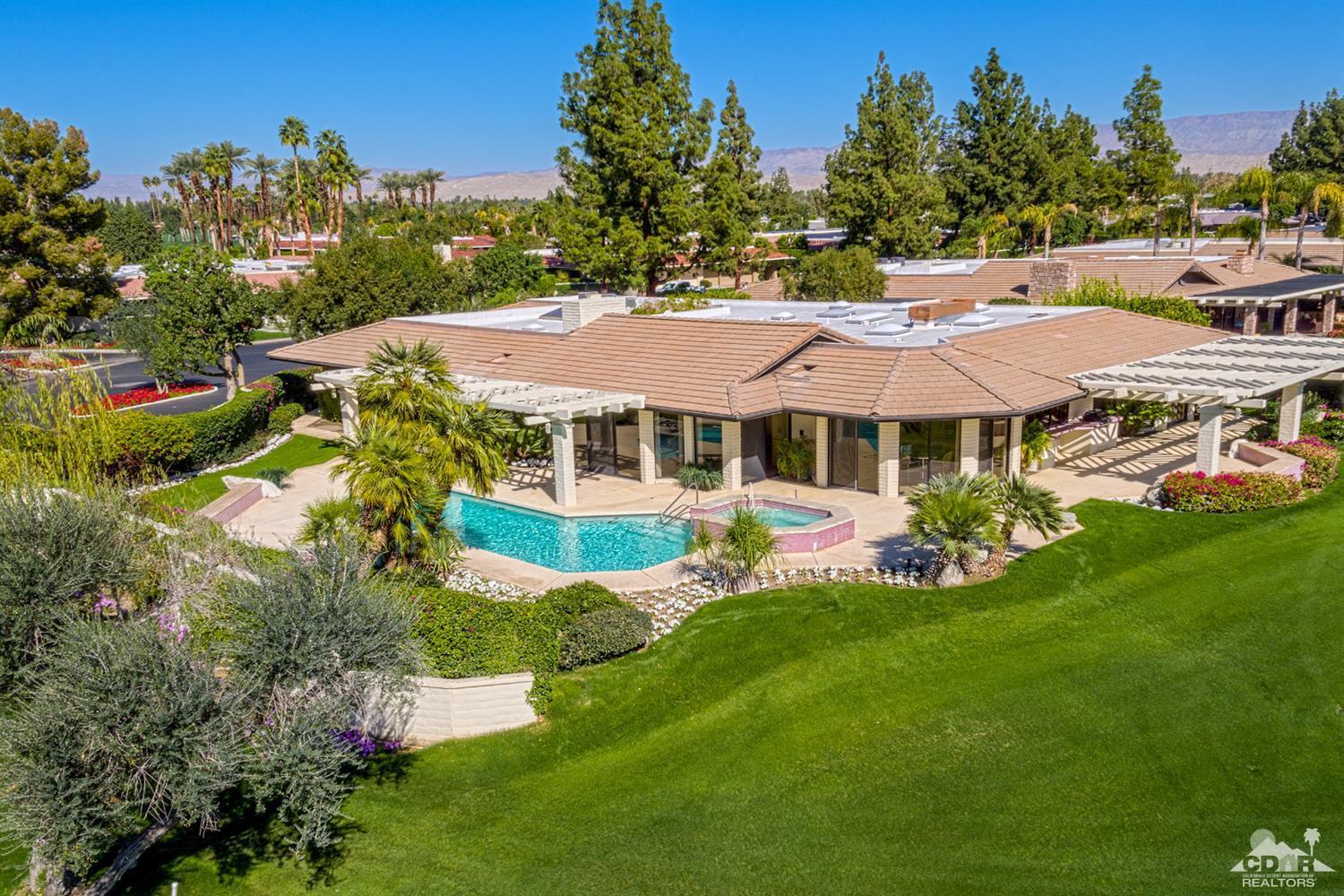 24 Johnar Boulevard Rancho Mirage, CA 92270 - Photo 21 of 26 a aerial view of a house with swimming pool a yard and lake view
