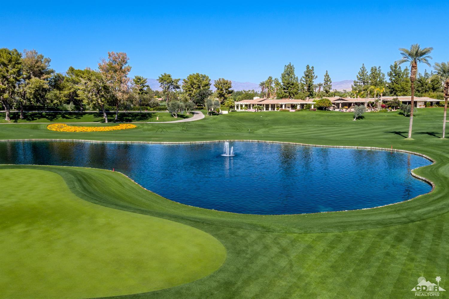 24 Johnar Boulevard Rancho Mirage, CA 92270 - Photo 23 of 26 a view of a golf course with a lake