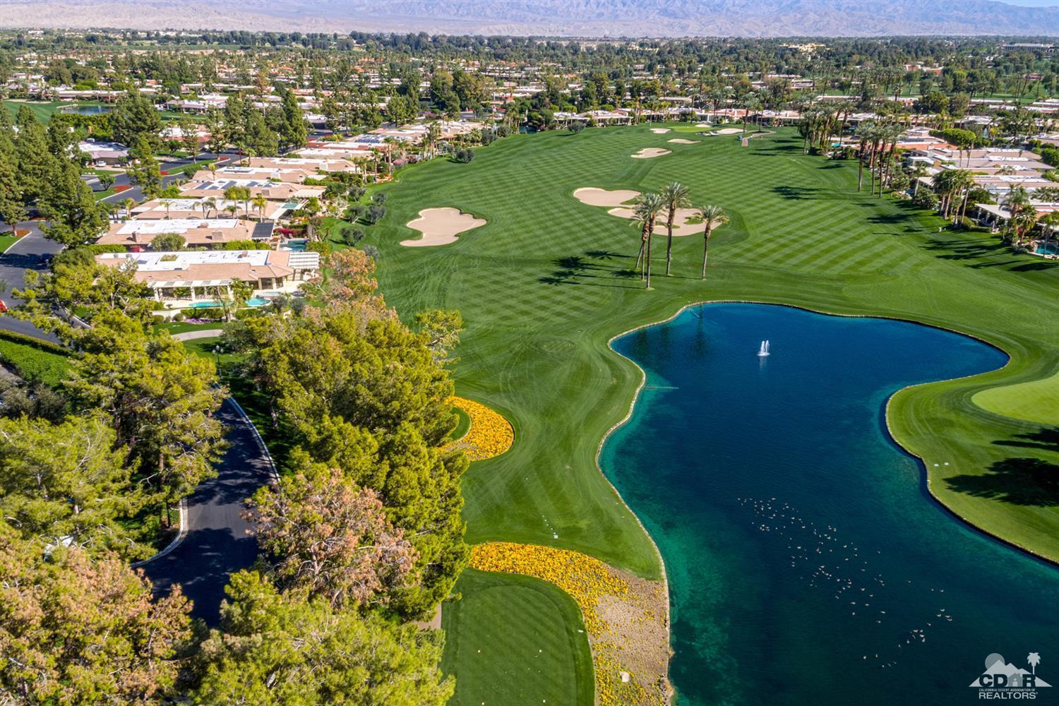 24 Johnar Boulevard Rancho Mirage, CA 92270 - Photo 24 of 26 an aerial view of a house with a lake view