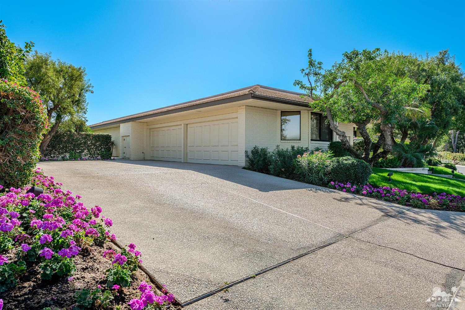 24 Johnar Boulevard Rancho Mirage, CA 92270 - Photo 26 of 26 a front view of a house with a yard