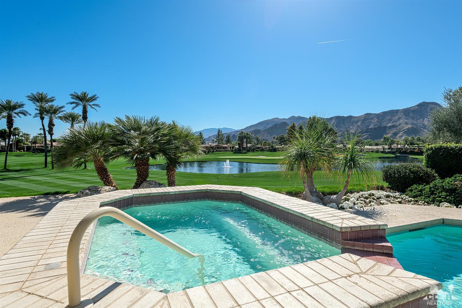 24 Johnar Boulevard Rancho Mirage, CA 92270 - Photo 4 of 26 a view of a swimming pool with a patio