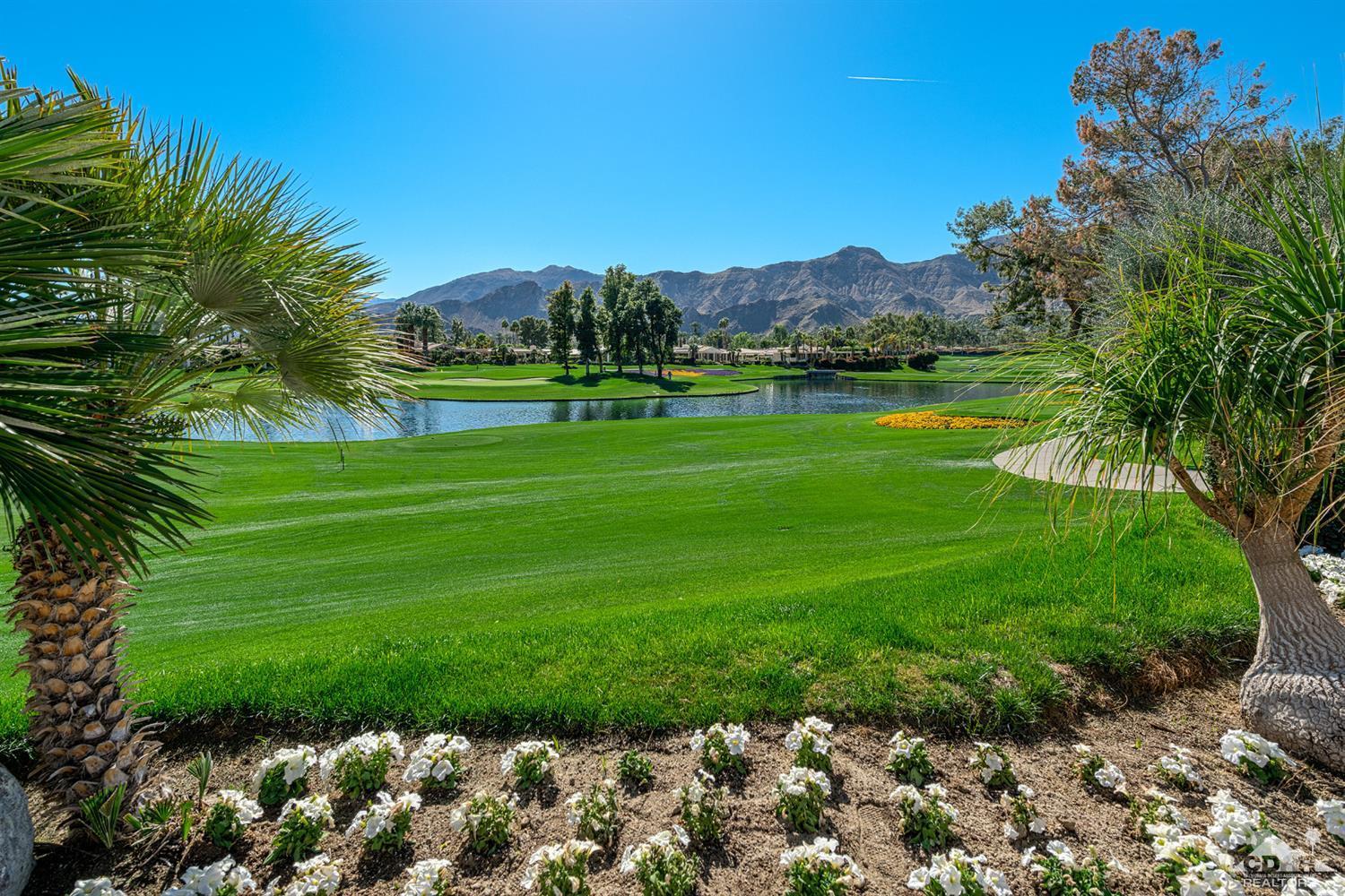 24 Johnar Boulevard Rancho Mirage, CA 92270 - Photo 6 of 26 a view of a golf course with a garden