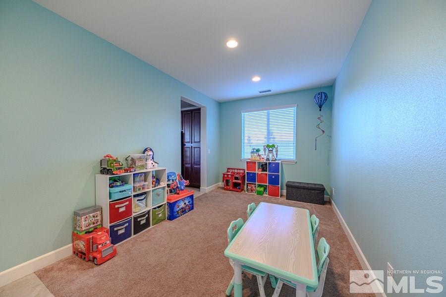 10062 Ignacio Circle Reno, NV 89521 - Photo 8 of 18 a view of a workspace with furniture