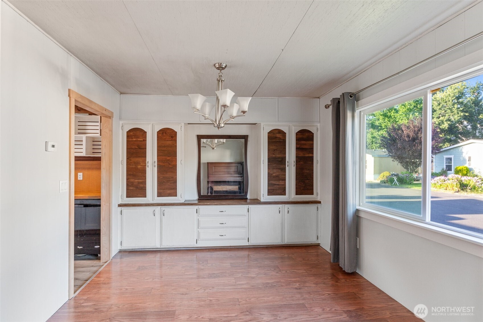 8510 Martin Way East, Unit 25 Lacey, WA 98516 - Photo 5 of 26 a view of an empty room with a window
