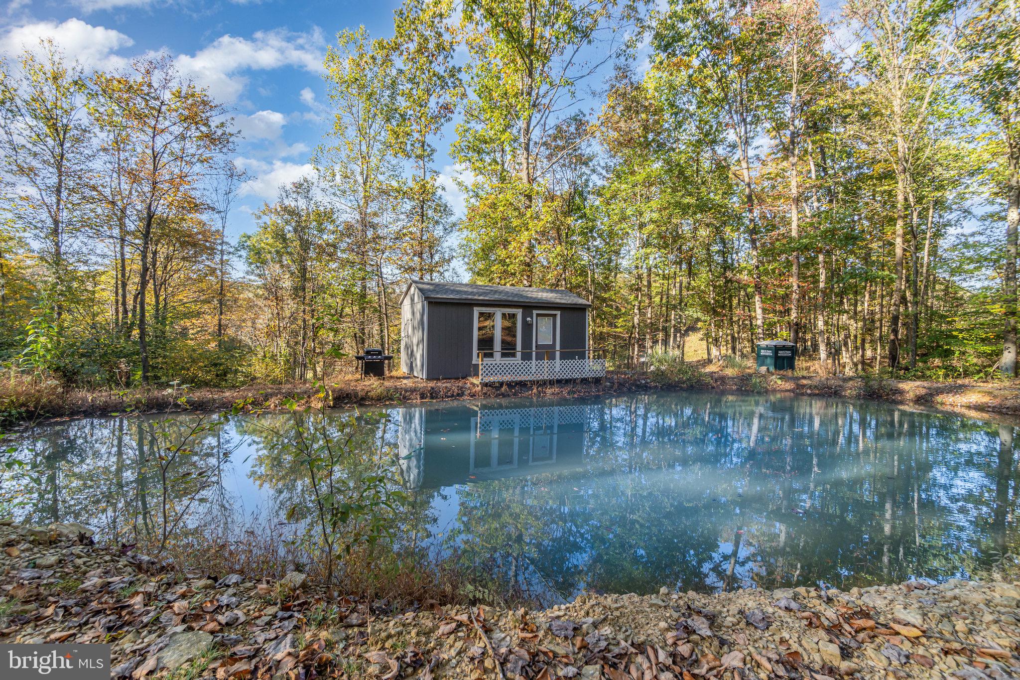 1180 Campbell Hollow Road East Waterford, PA 17021 - Photo 19 of 51 a view of a house with a yard