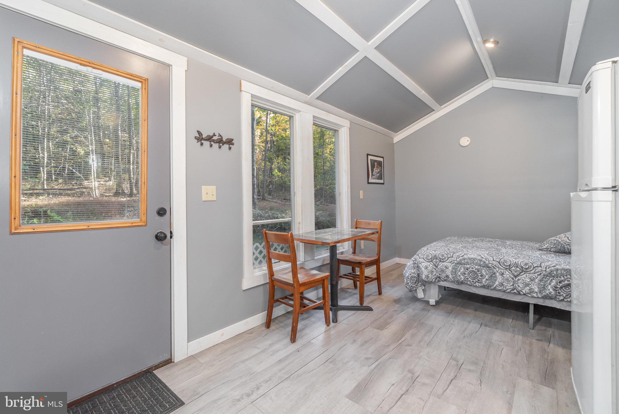 1180 Campbell Hollow Road East Waterford, PA 17021 - Photo 23 of 51 a bedroom with a bed and a window