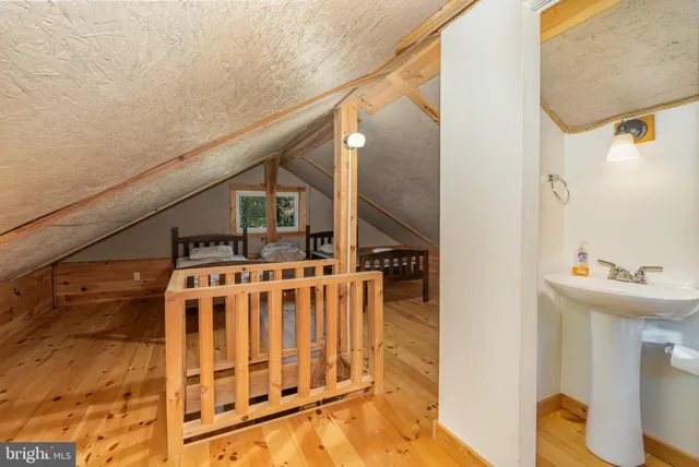 a view of a yard with swimming pool and trees