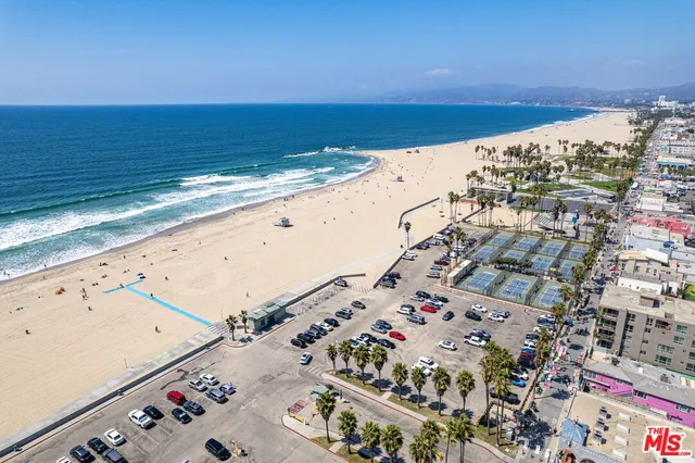 an aerial view of beach and ocean