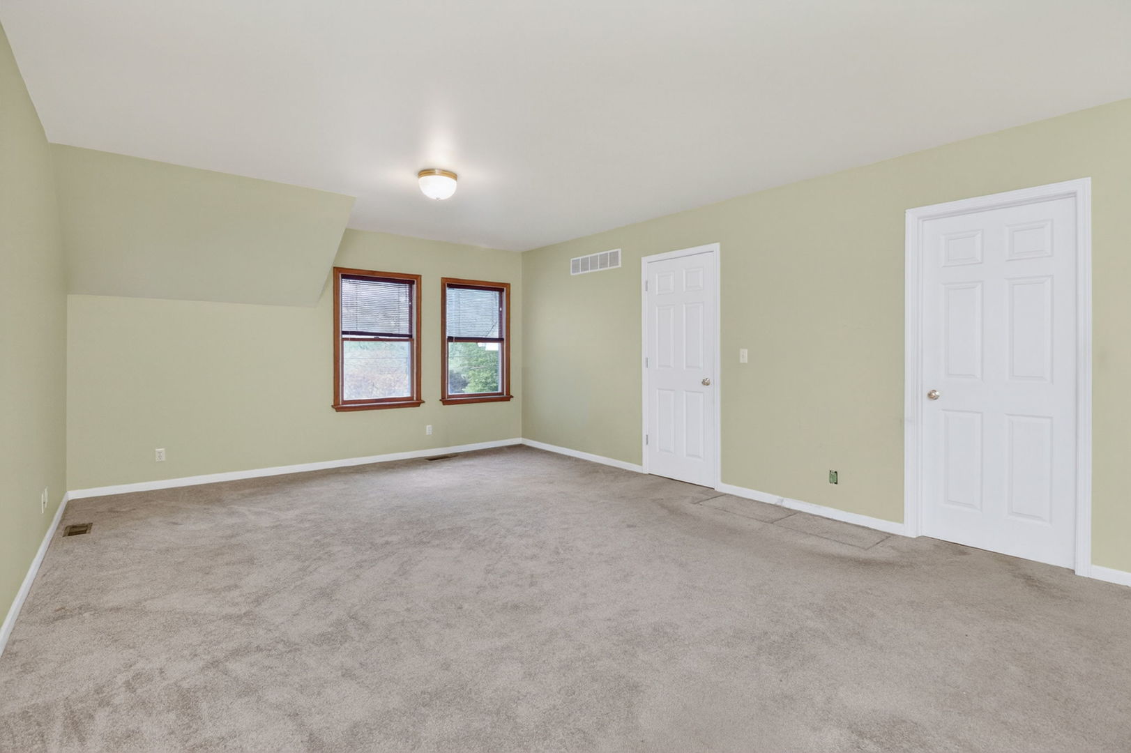 32W183 Glos Street Wayne, IL 60184 - Photo 14 of 30 an empty room with windows