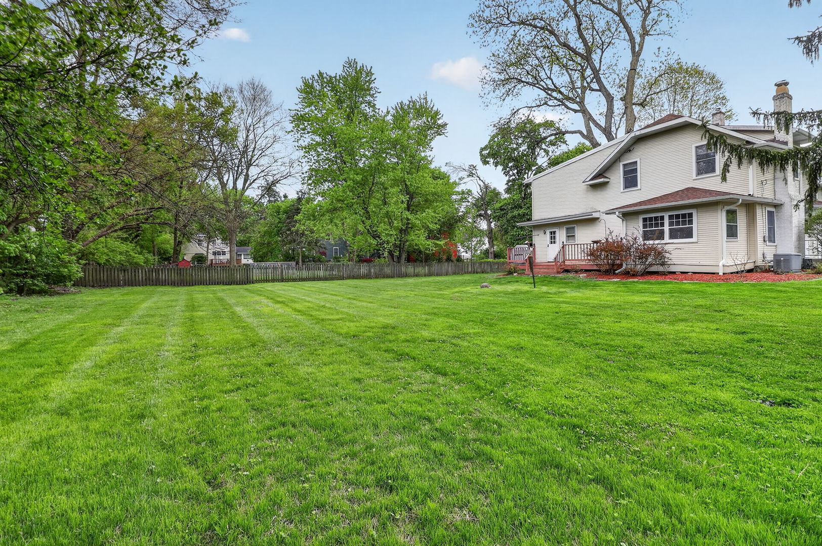 32W183 Glos Street Wayne, IL 60184 - Photo 26 of 30 a view of a house with a big yard