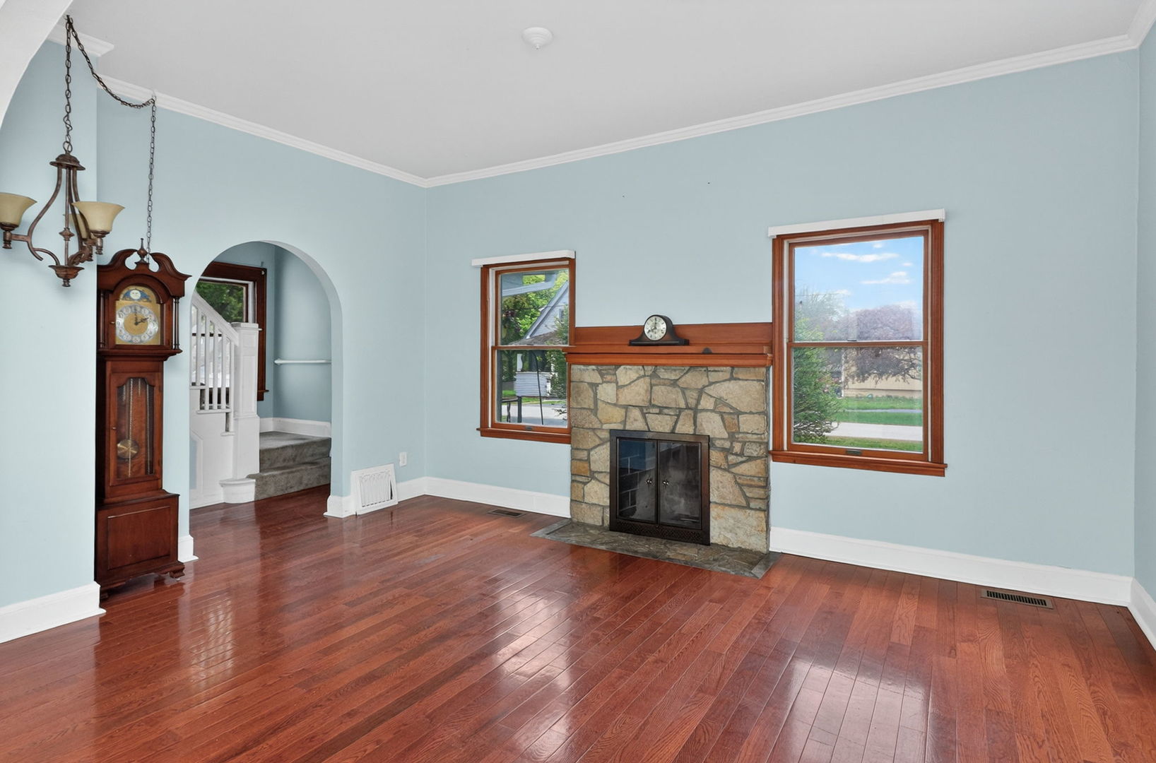 32W183 Glos Street Wayne, IL 60184 - Photo 3 of 30 a view of empty room with fireplace and wooden floor