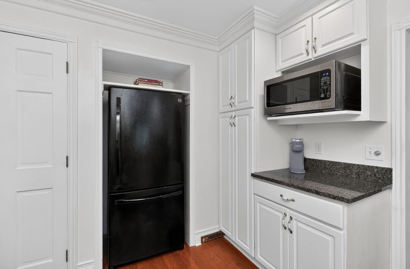 32W183 Glos Street Wayne, IL 60184 - Photo 7 of 30 a kitchen with a refrigerator stove and microwave