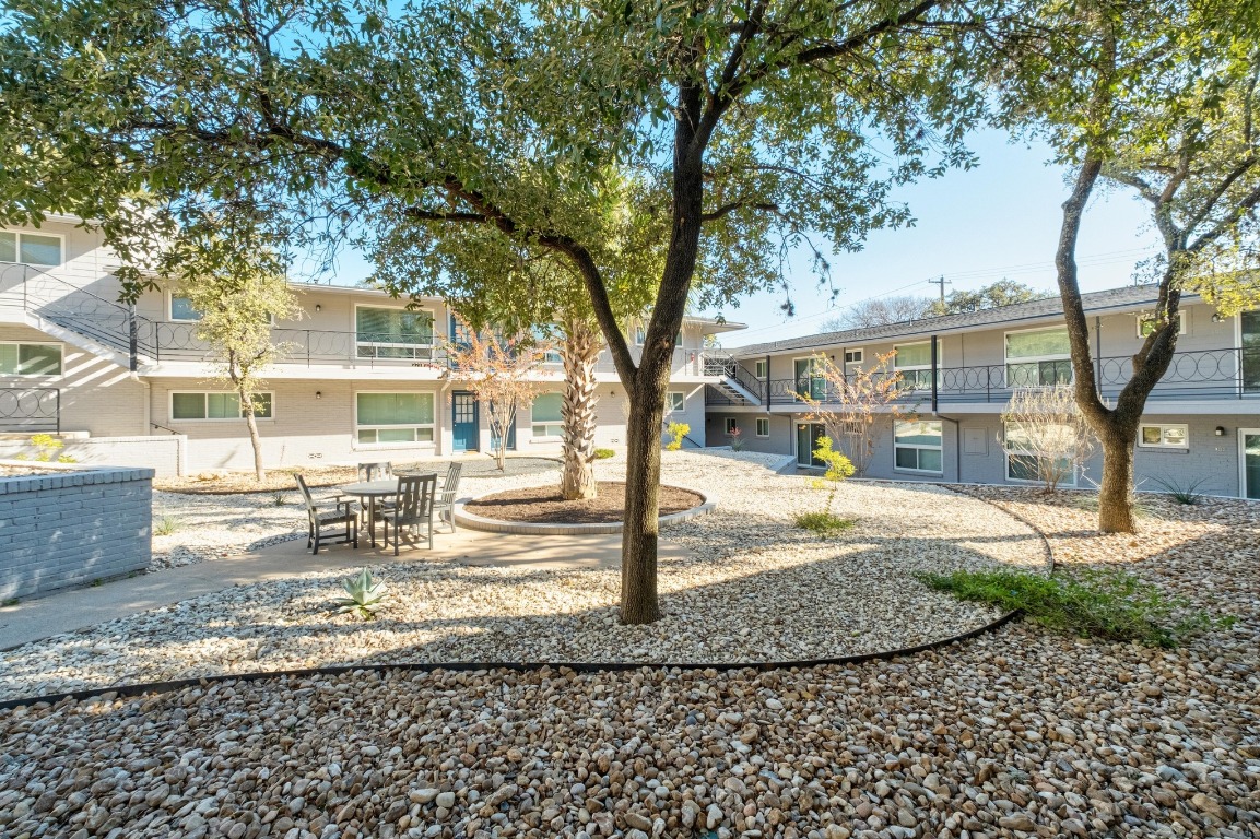 1210 Windsor Road, Unit 122 Austin, TX 78703 - Photo 5 of 24 View of home's community featuring a balcony and a patio