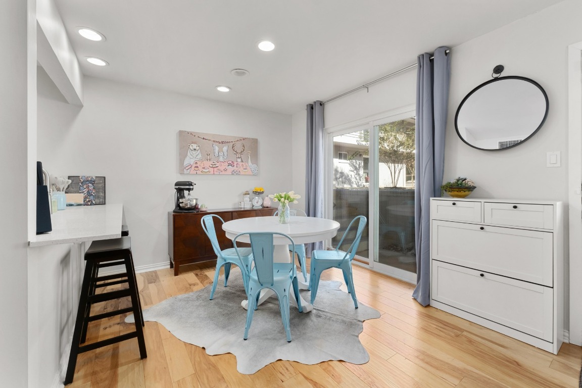 1210 Windsor Road, Unit 122 Austin, TX 78703 - Photo 7 of 24 Dining room featuring recessed lighting and light wood-type flooring