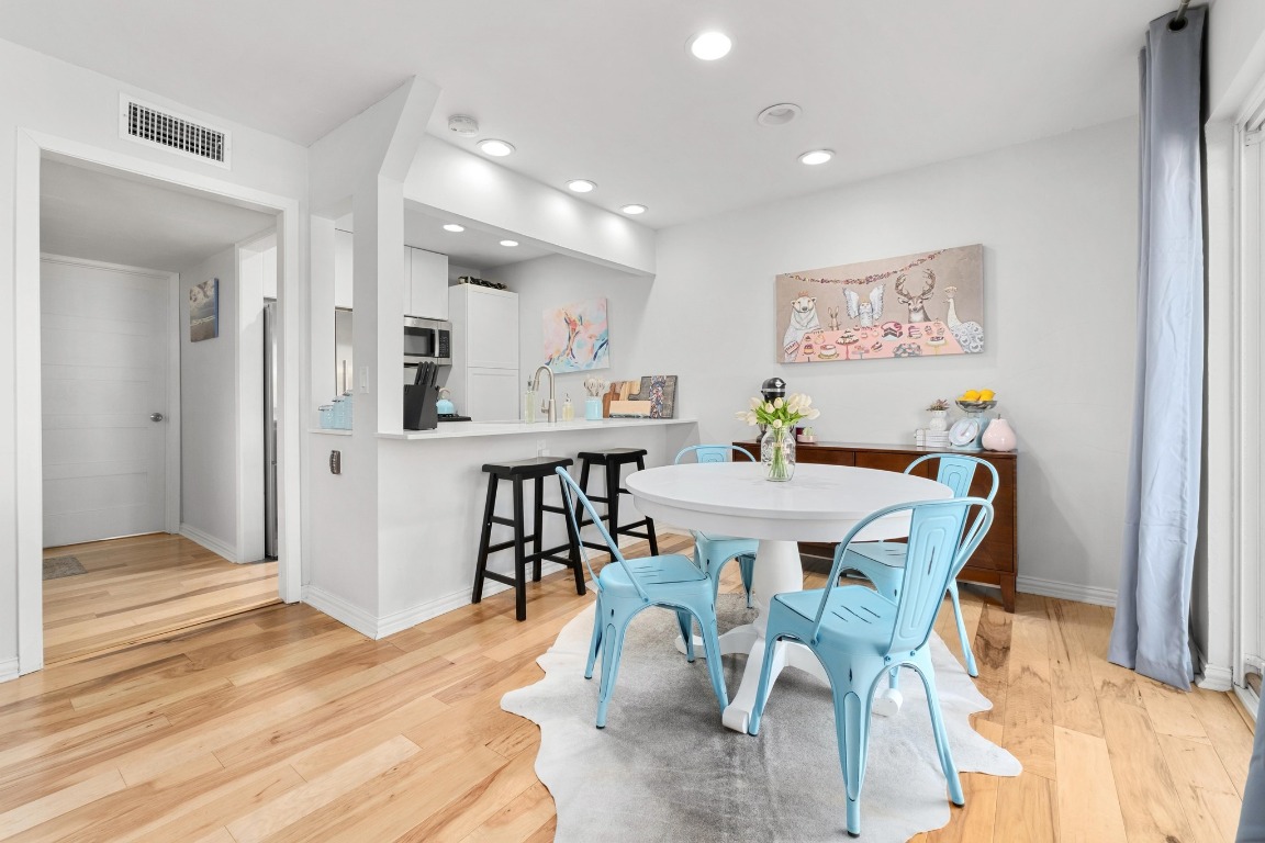 1210 Windsor Road, Unit 122 Austin, TX 78703 - Photo 8 of 24 Dining room with light wood-type flooring and recessed lighting