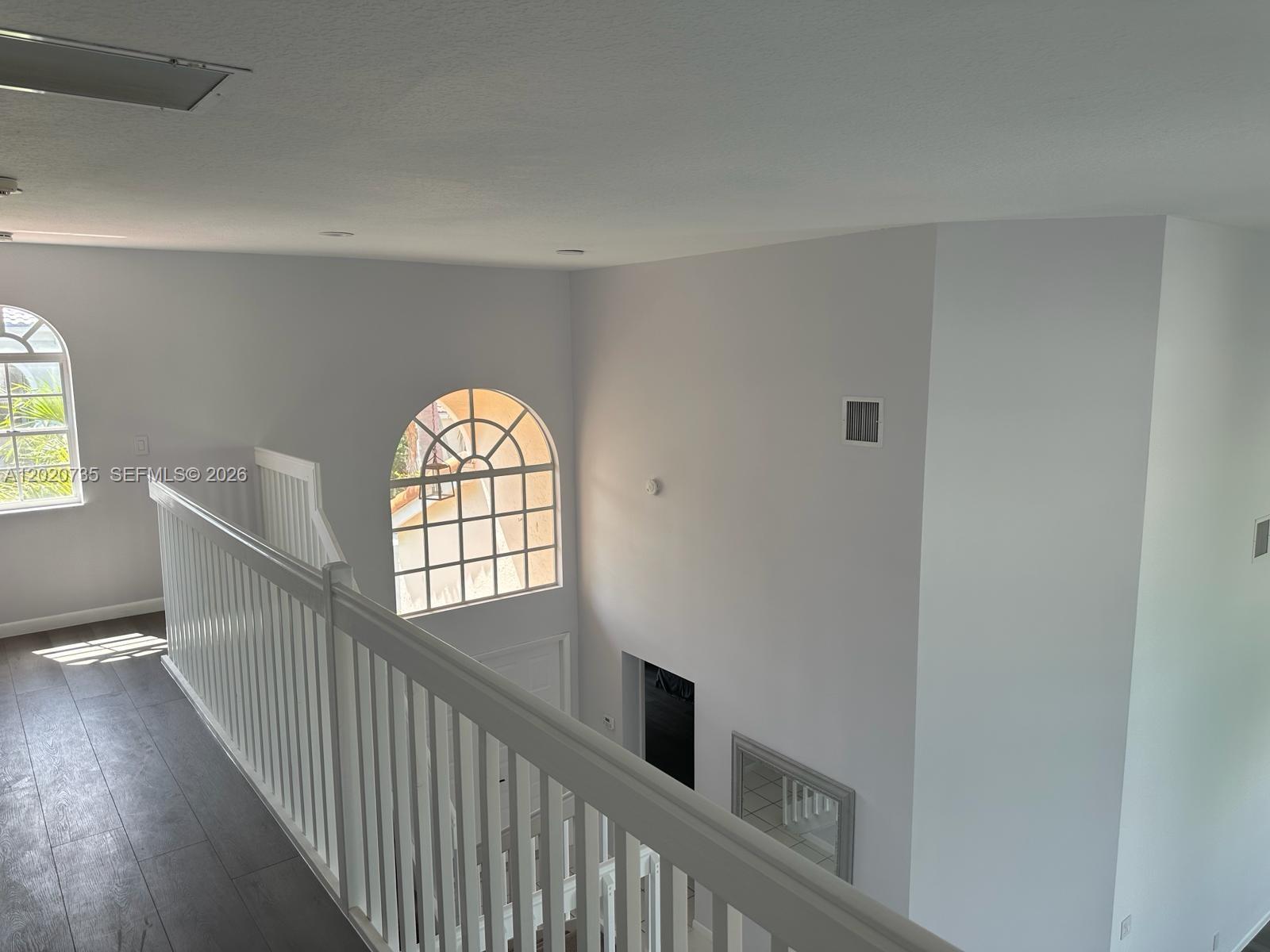 17244 Balboa Point Way Boca Raton, FL 33487 - Photo 23 of 66 a view of an entryway with wooden floor