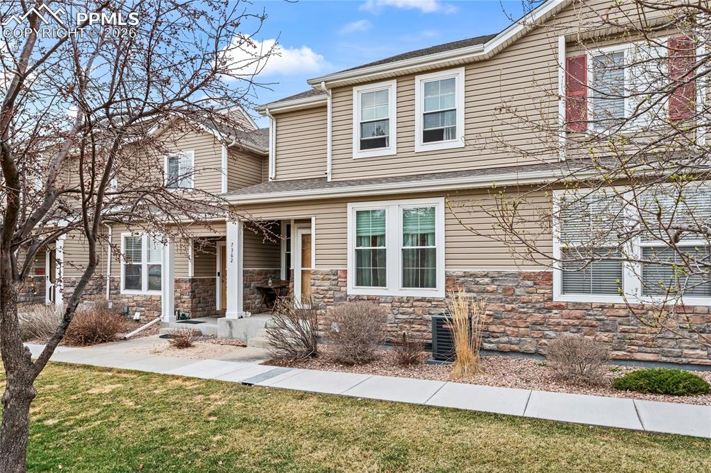 7362 Sandy Springs Point Fountain, CO 80817 - Photo 2 of 41 front view of a house with a yard