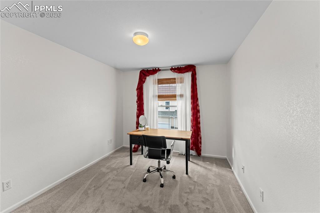 7362 Sandy Springs Point Fountain, CO 80817 - Photo 24 of 41 a workspace with furniture and window