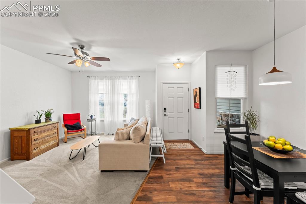 7362 Sandy Springs Point Fountain, CO 80817 - Photo 5 of 41 a living room with furniture and a wooden floor