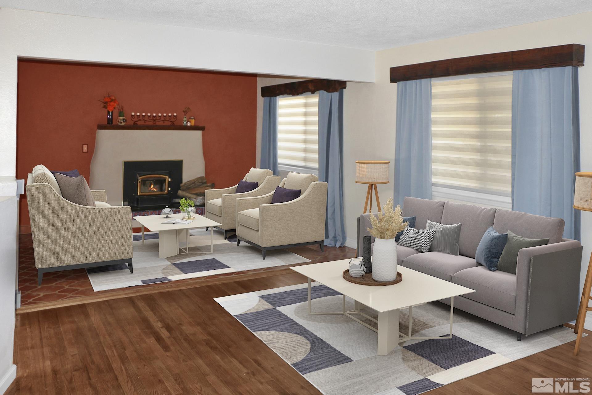a living room with furniture a fireplace and window