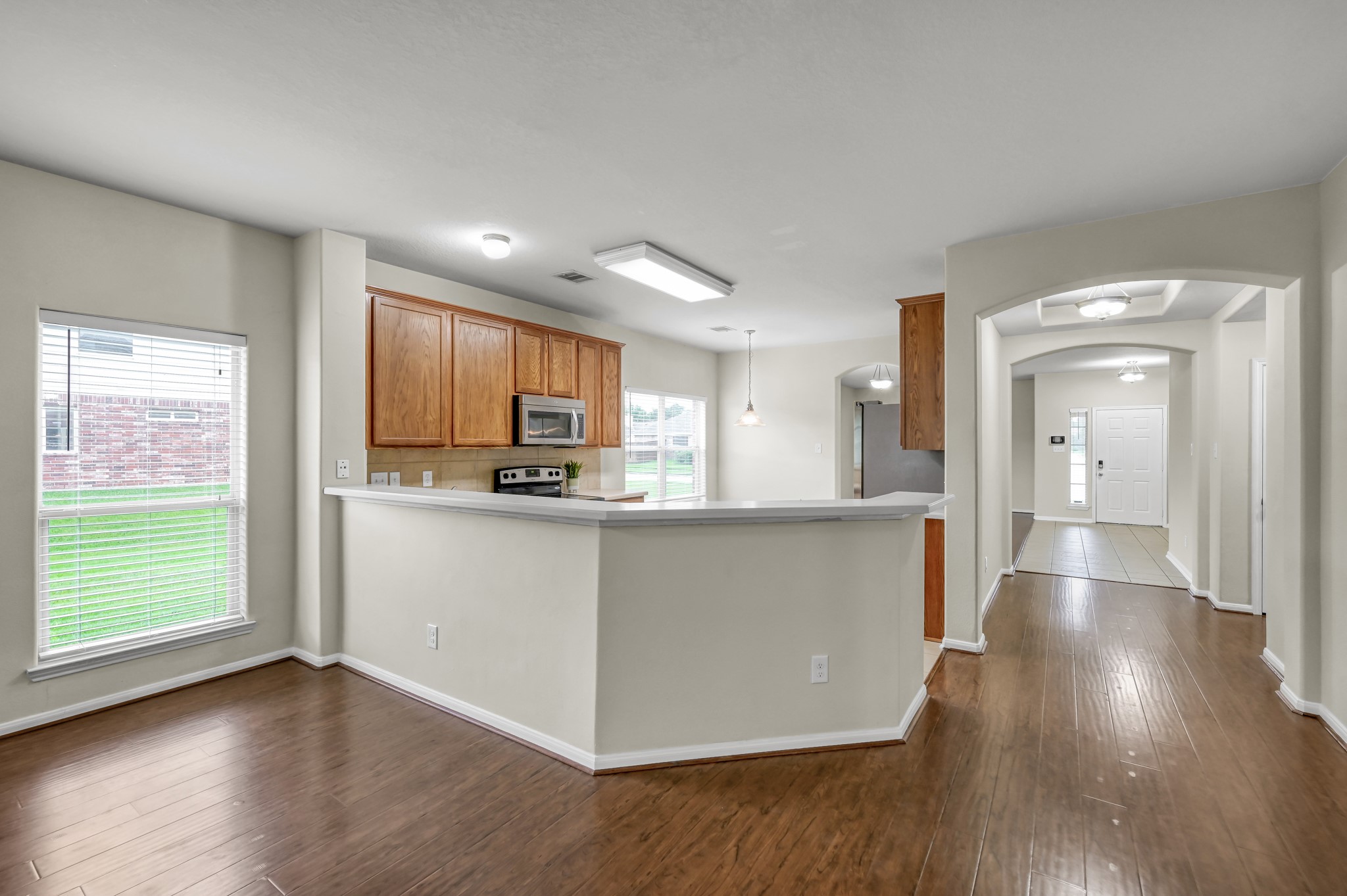 631 Timberstand Lane Spring, TX 77373 - Photo 13 of 38 The open kitchen overlooks the main living area, creating the perfect setup for entertaining and staying connected.
