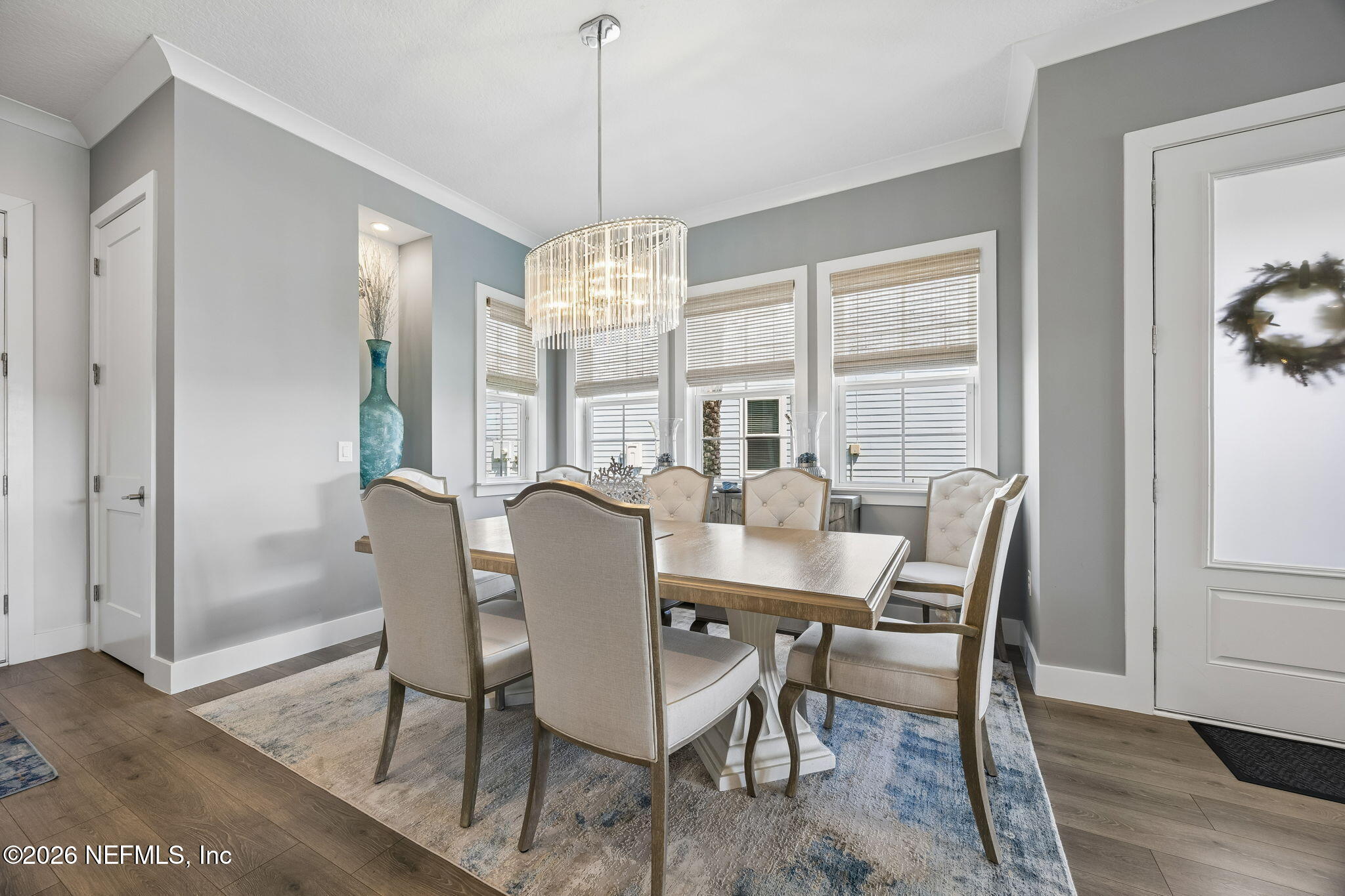 662 Rum Runner Way St. Johns, FL 32259 - Photo 13 of 79 a view of a dining room with furniture window and wooden floor