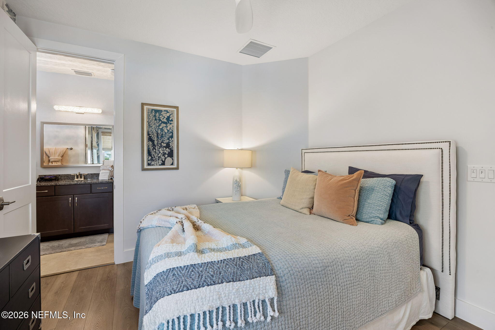 662 Rum Runner Way St. Johns, FL 32259 - Photo 35 of 79 a bedroom with a bed and a view of kitchen