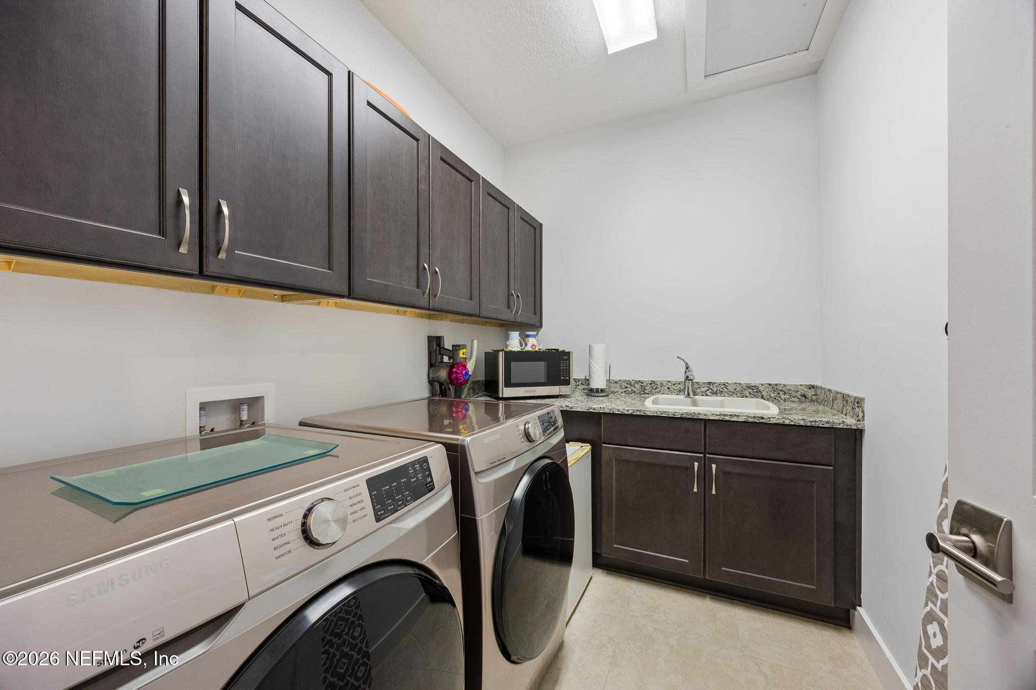 662 Rum Runner Way St. Johns, FL 32259 - Photo 41 of 79 a utility room with sink dryer and washer