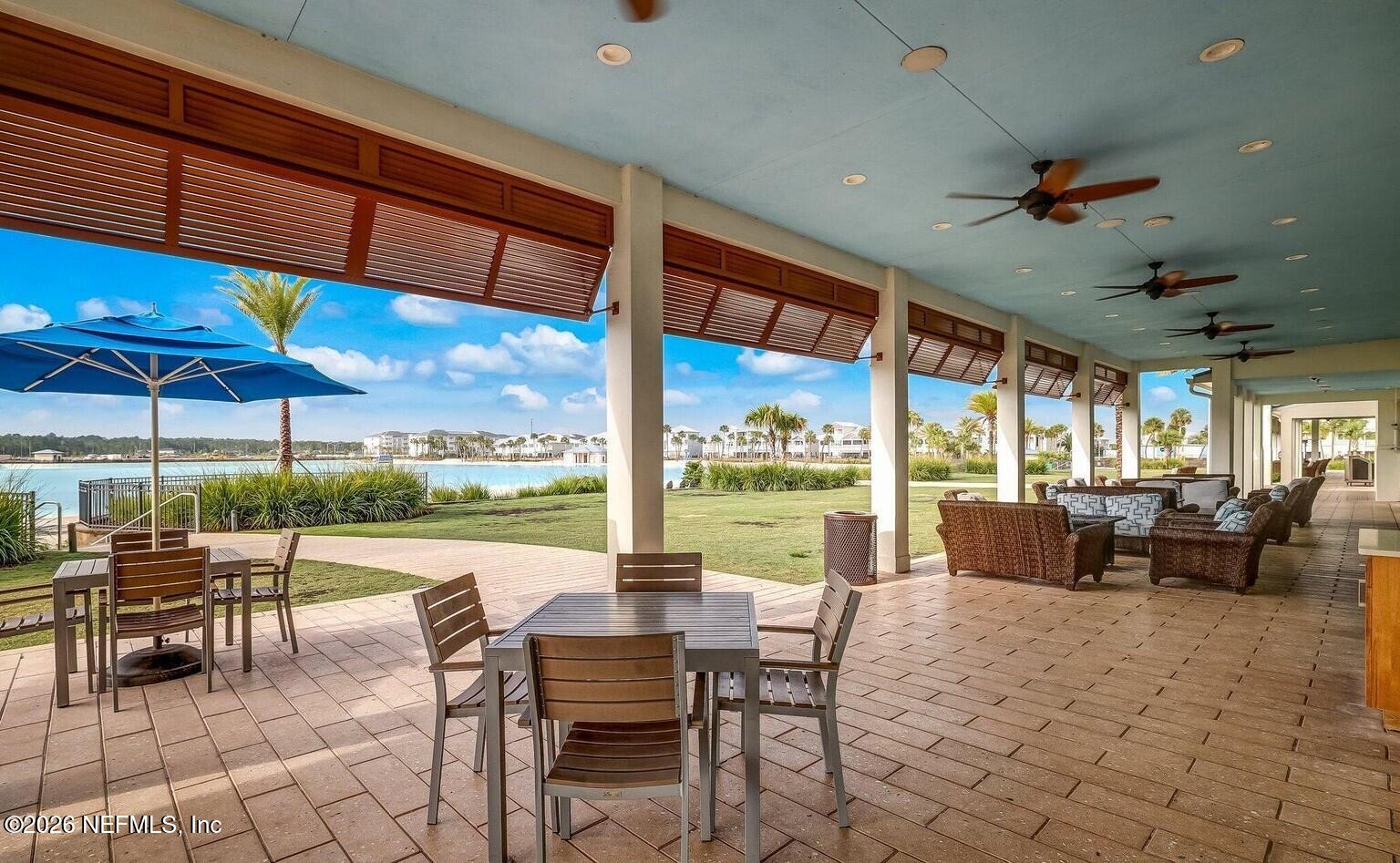 662 Rum Runner Way St. Johns, FL 32259 - Photo 67 of 79 a dining room with furniture and outdoor view