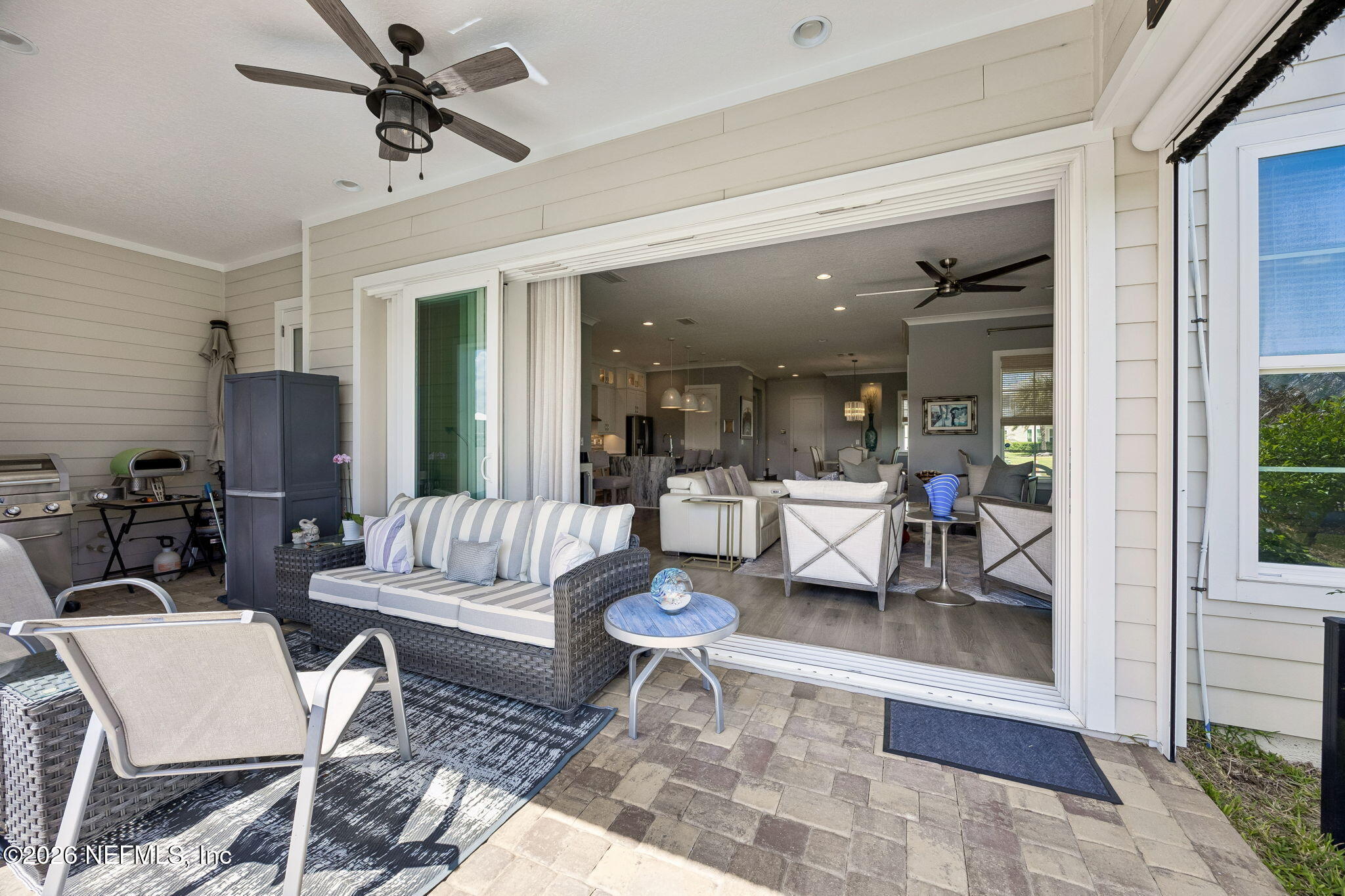 662 Rum Runner Way St. Johns, FL 32259 - Photo 9 of 79 a living room with furniture and a large window