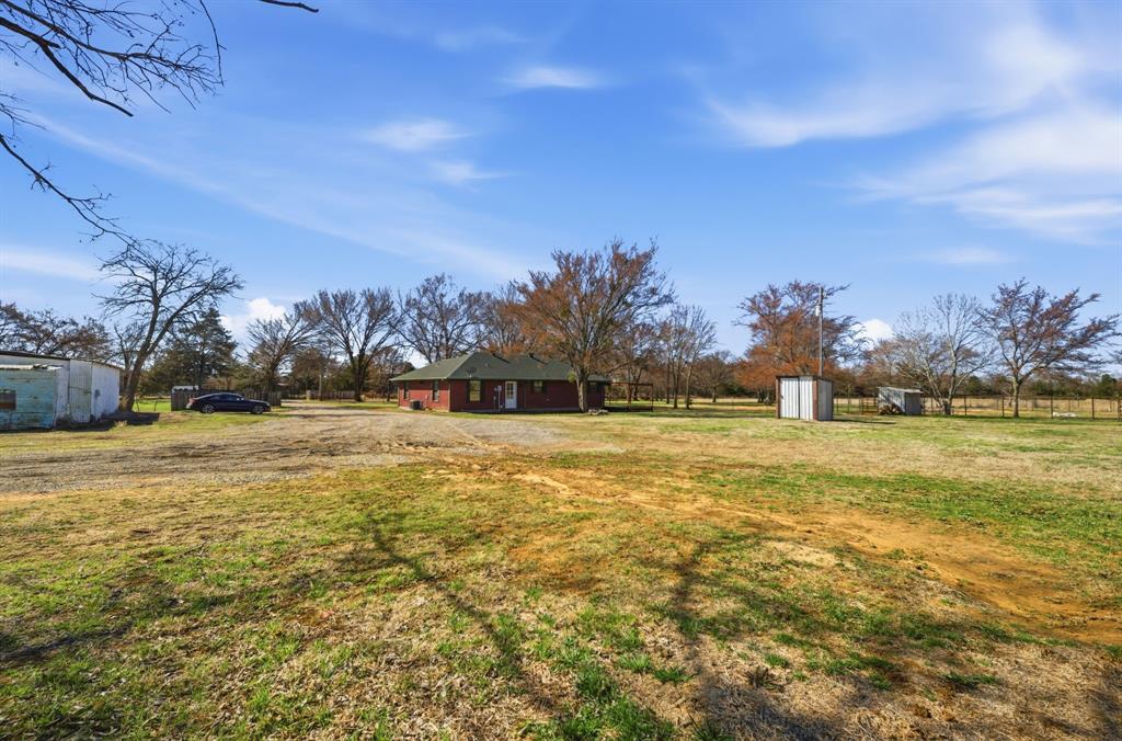 697 County Road 166 Whitesboro, TX 76273 - Photo 25 of 32 a view of yard with lake view