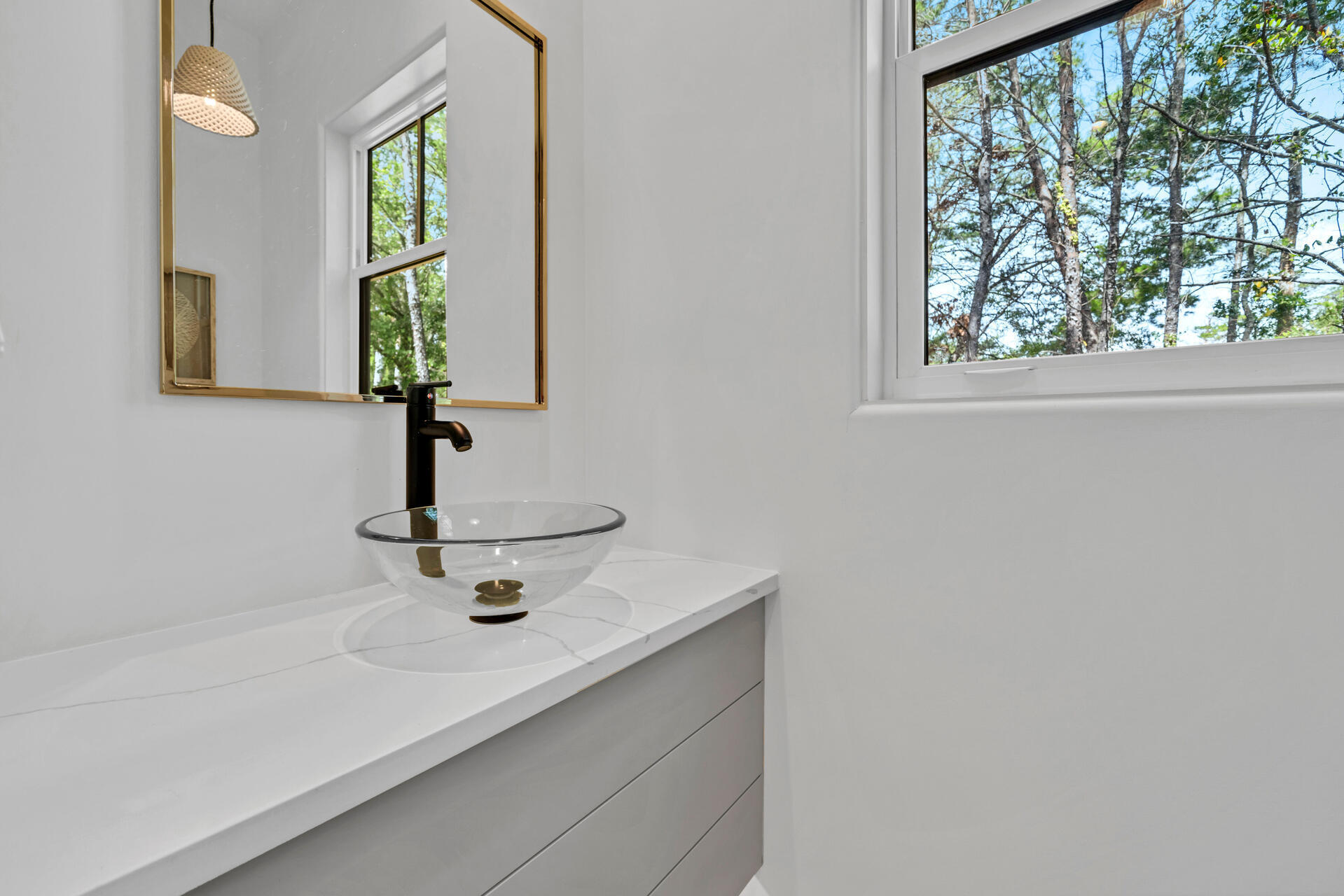 250 Grande Pointe Cir Inlet Beach Inlet Beach, FL 32461 - Photo 22 of 48 a bathroom with a sink and a mirror