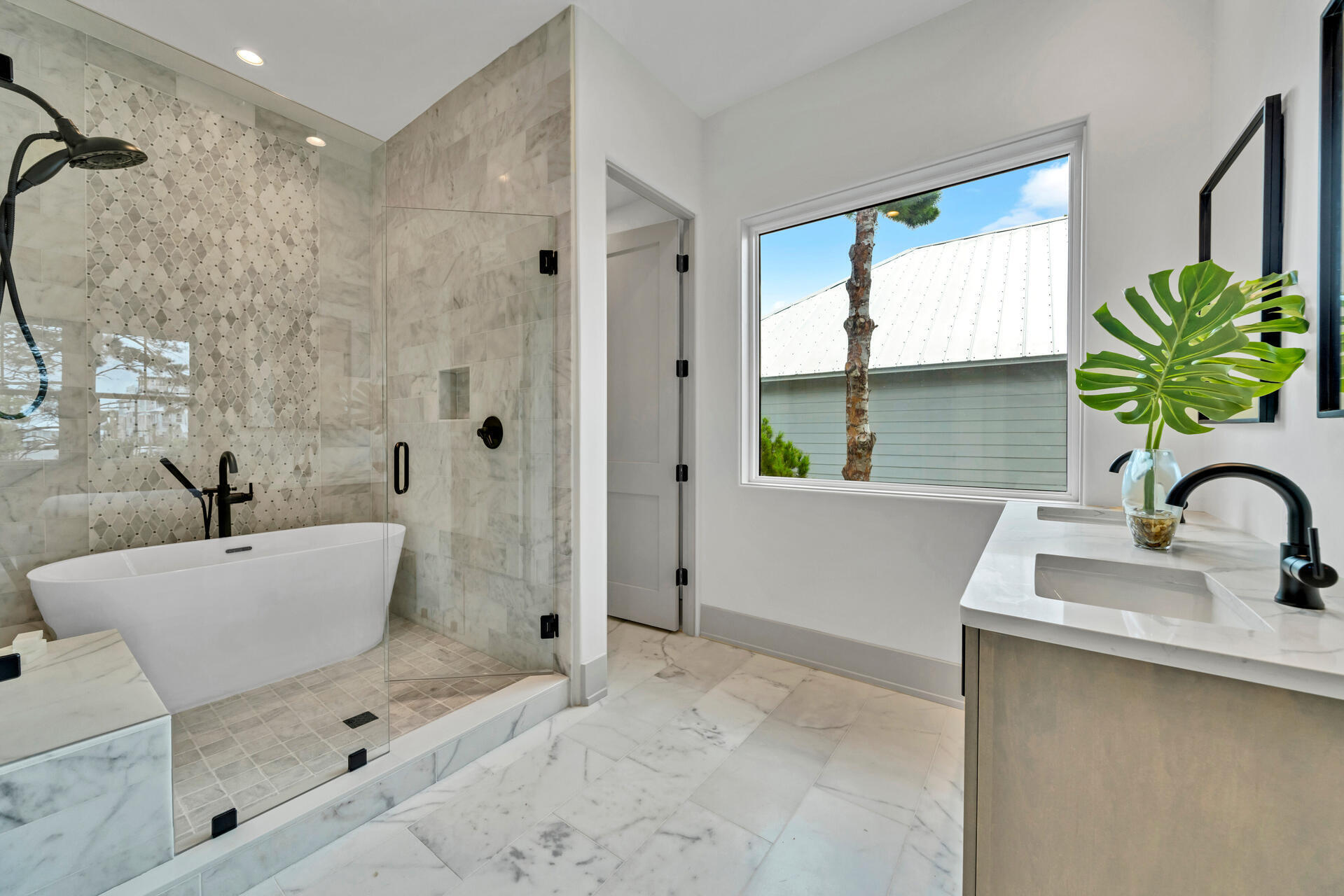 250 Grande Pointe Cir Inlet Beach Inlet Beach, FL 32461 - Photo 38 of 48 a bathroom with a bathtub sink and mirror