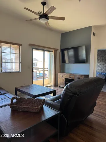 a living room with a couch and a flat screen tv