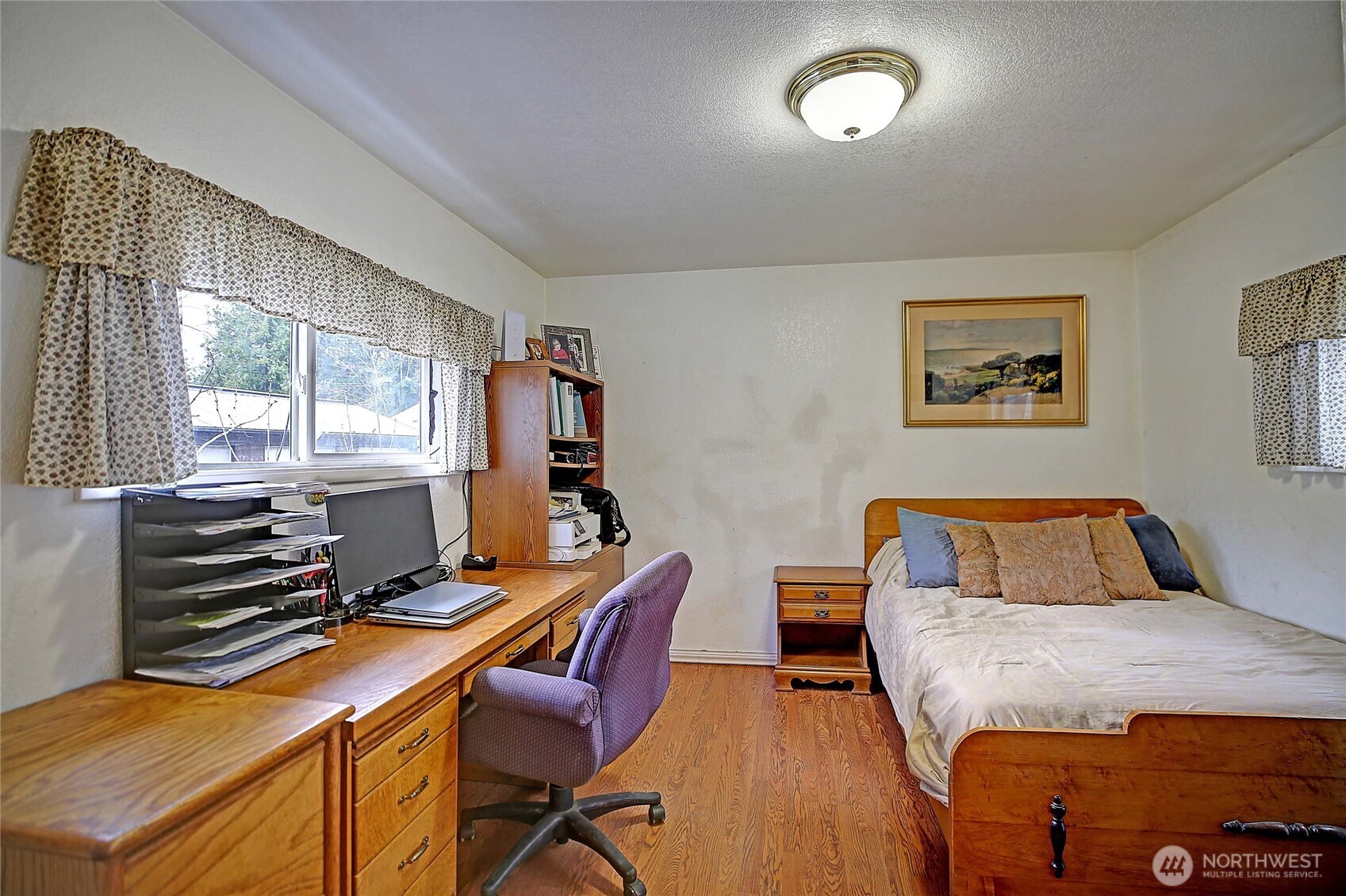 39729 State Rte 530 Northeast Arlington, WA 98223 - Photo 14 of 40 a bedroom with a bed and a window