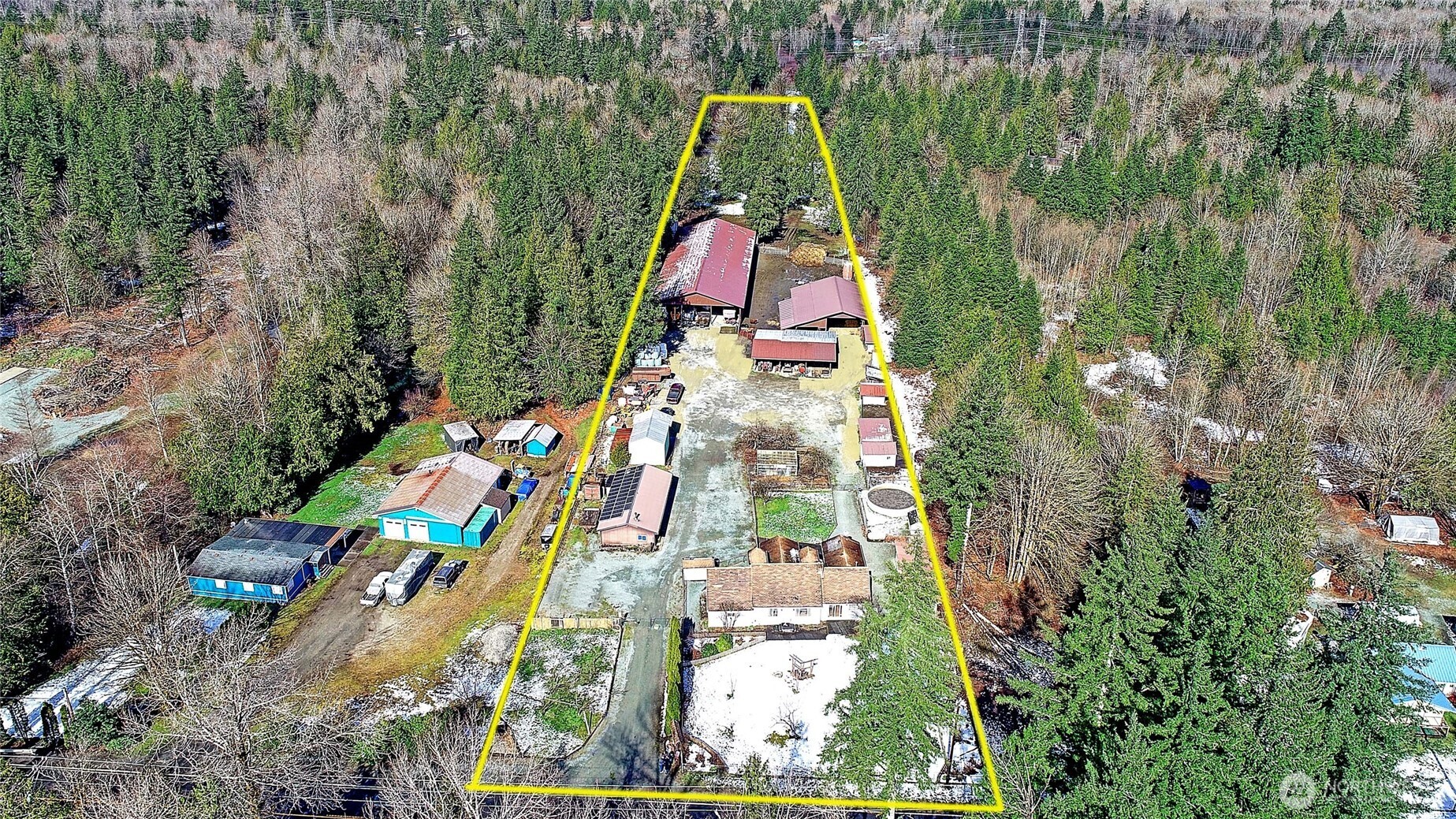 39729 State Rte 530 Northeast Arlington, WA 98223 - Photo 2 of 40 an aerial view of residential houses with outdoor space and trees