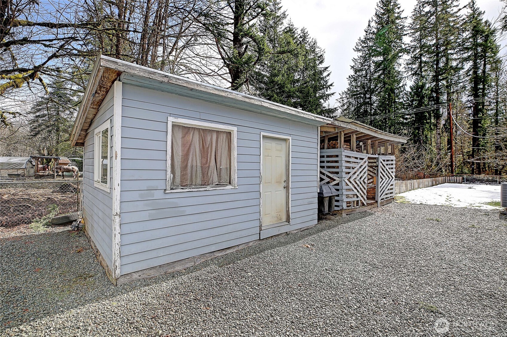 39729 State Rte 530 Northeast Arlington, WA 98223 - Photo 21 of 40 a view of a house with a yard and wooden fence