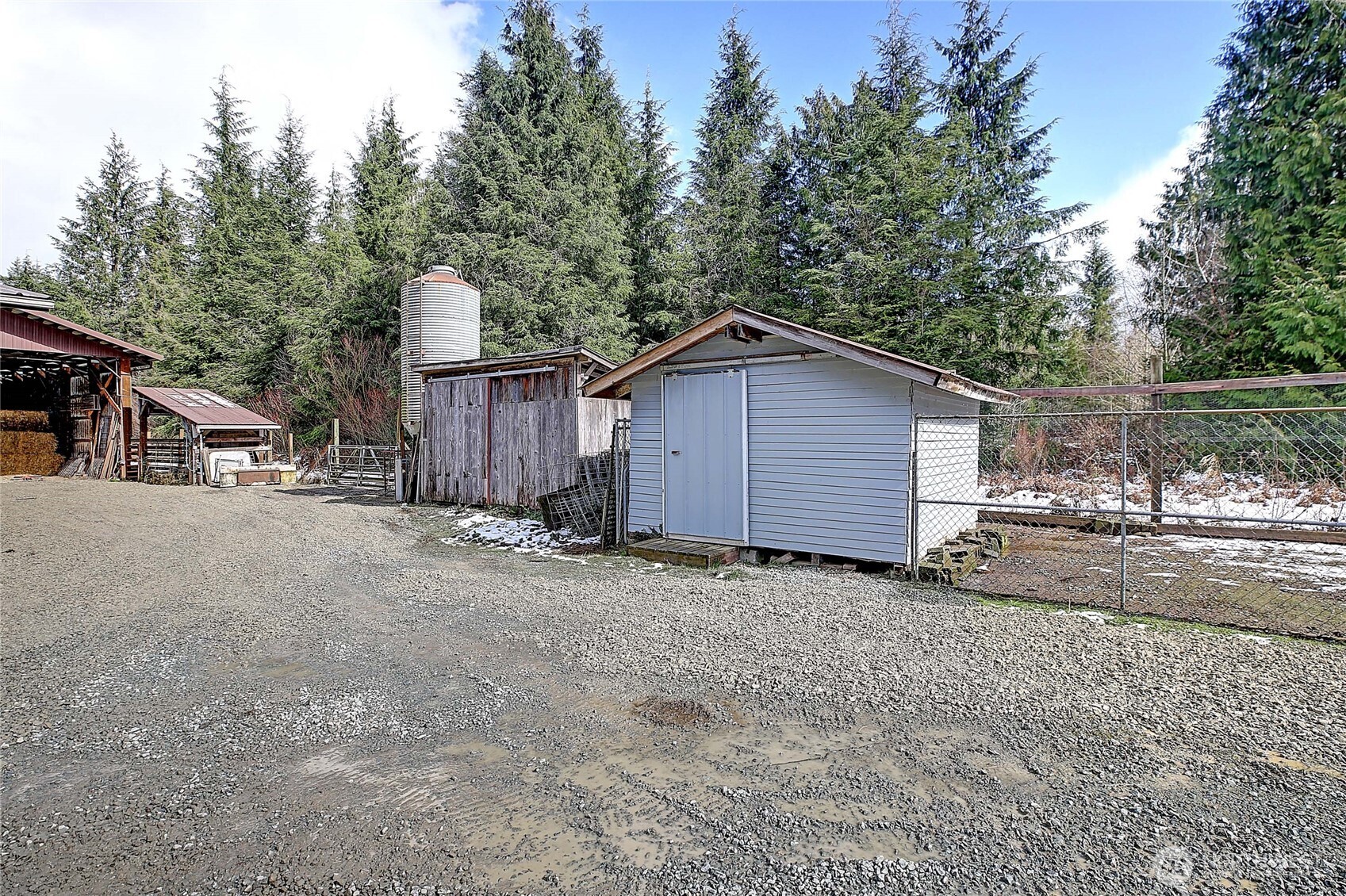 39729 State Rte 530 Northeast Arlington, WA 98223 - Photo 23 of 40 a view of a house with backyard and trees